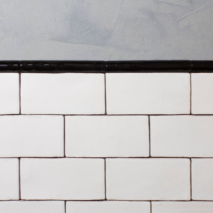 Black glazed trim tile