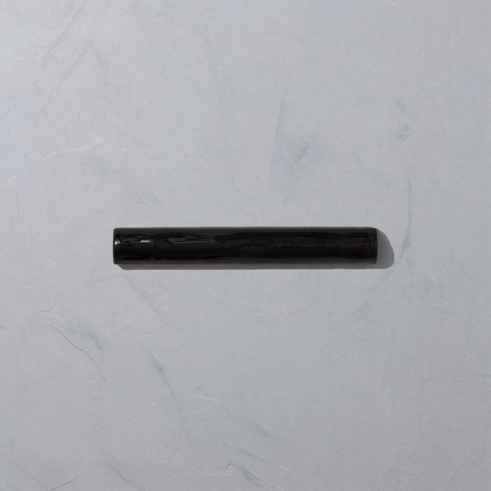 Black glazed trim tile