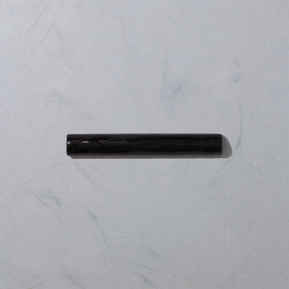 Black glazed trim tile