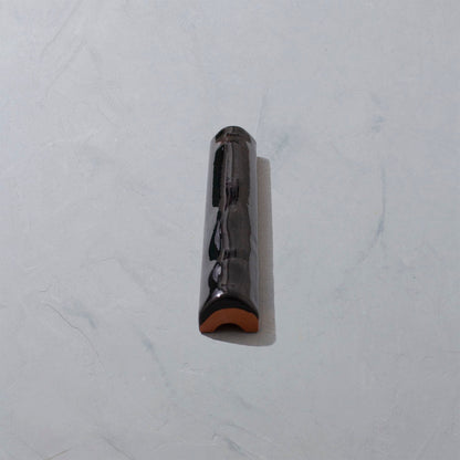 Black glazed trim tile