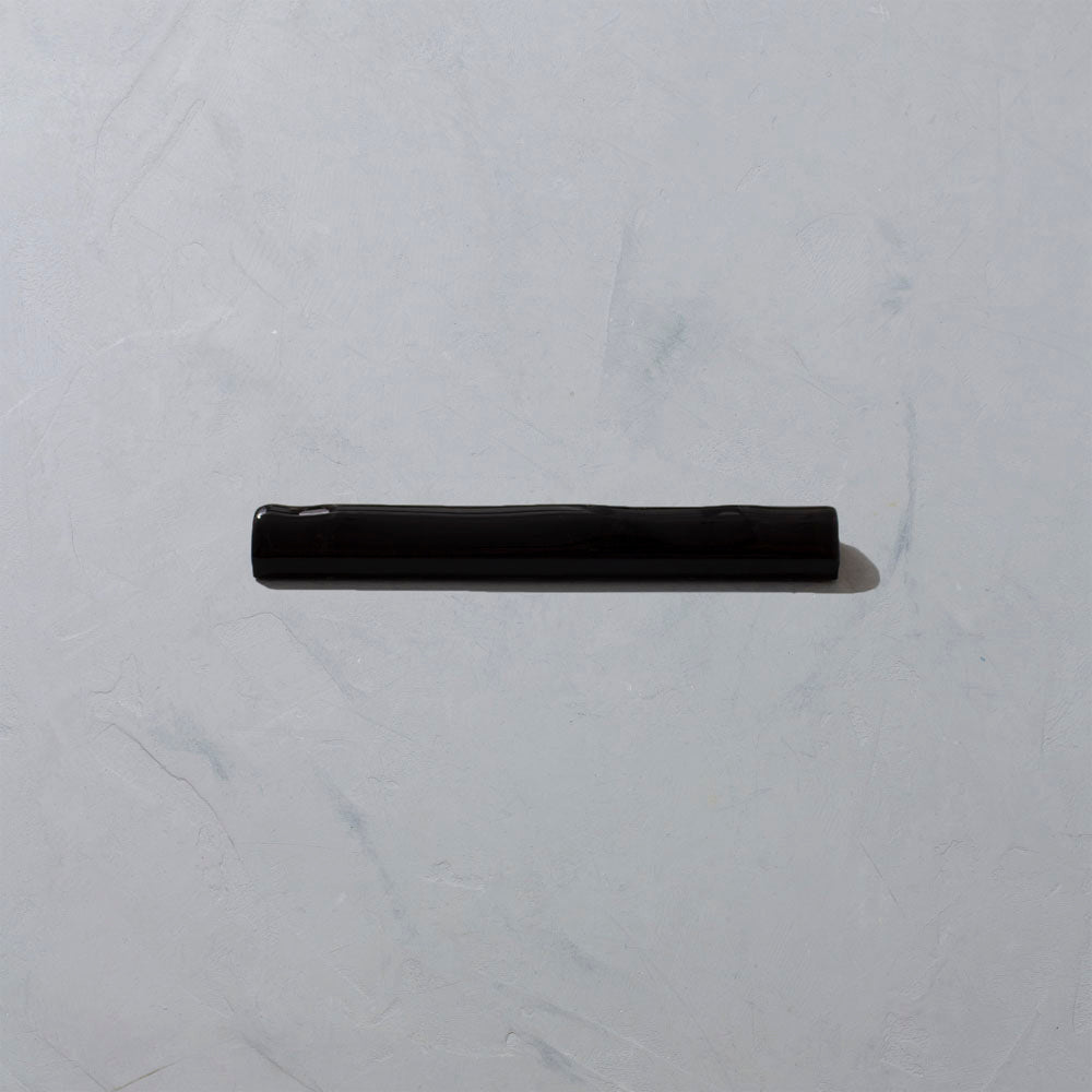 Black glazed trim tile